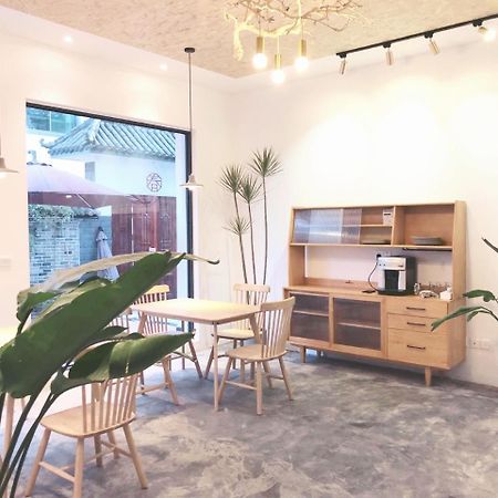 Spring Breeze Boutique Guest House Wuyuan Bagian luar foto