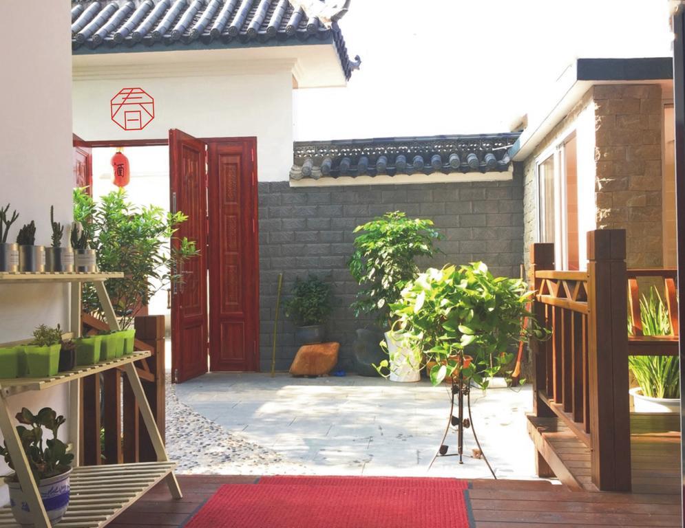 Spring Breeze Boutique Guest House Wuyuan Bagian luar foto