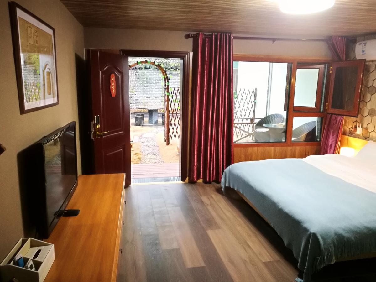 Spring Breeze Boutique Guest House Wuyuan Bagian luar foto