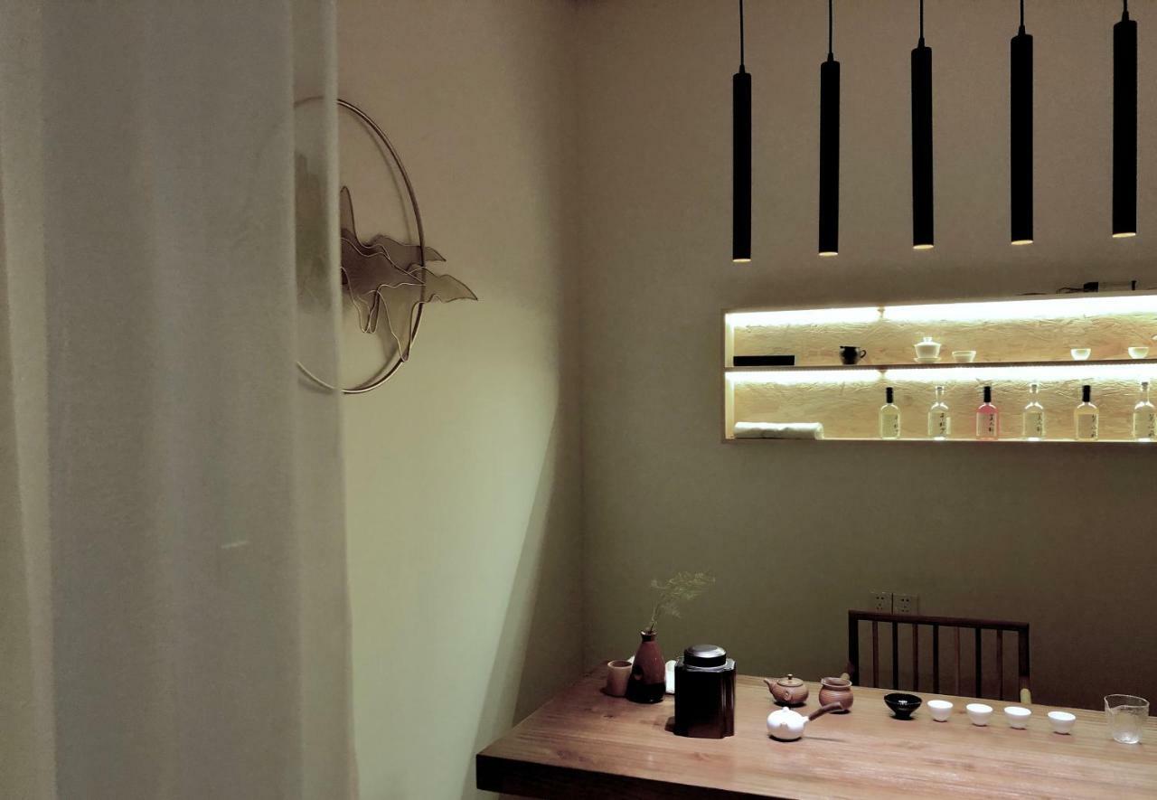 Spring Breeze Boutique Guest House Wuyuan Bagian luar foto
